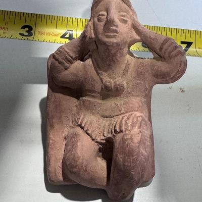 Sale Photo Thumbnail #150: The image shows a vintage 1960s promotional clay figurine used by the pharmaceutical company Schering for their drug Etrafon, which was prescribed for anxiety and depression. 
About the Figurine:
Origin and Style: It is a reproduction of an ancient Pre-Co
