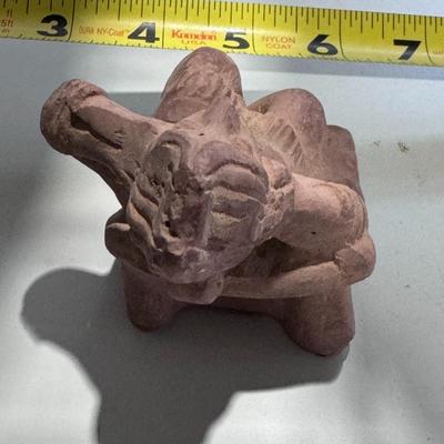 Sale Photo Thumbnail #149: The image shows a vintage 1960s promotional clay figurine used by the pharmaceutical company Schering for their drug Etrafon, which was prescribed for anxiety and depression. 
About the Figurine:
Origin and Style: It is a reproduction of an ancient Pre-Co