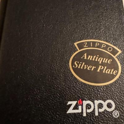 Sale Photo Thumbnail #184: Zippo lighter commemorating the 85th Anniversary of Camel cigarettes. It features the dates 1913 and 1998, along with the "Camel" logo and "85th Anniversary" text. The lighter has an antique silver plate finish and a design featuring a camel.