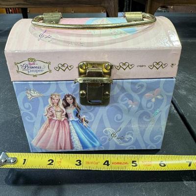 Sale Photo Thumbnail #730: Barbie as The Princess and the Pauper Storage Trunk from 2004. 
Here's more information about this item:
Product Type: It served as a storage trunk or carrying case for Barbie dolls and accessories, and some versions also functioned as musical jewelry box