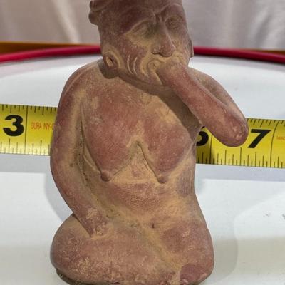 Sale Photo Thumbnail #158: The figure in your image is a Vintage "Portrait of Anxiety/Depression" Clay Pottery Figure, which is a 1960s promotional piece for a prescription drug company in Mexico, believed to be Etrafon. 
Here's more information about this intriguing figure:
Origin