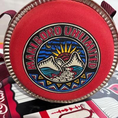 Sale Photo Thumbnail #735: Vintage Marlboro Unlimited Coleman Canteen.
Here's more information about this item:
Promotional Item: This canteen was part of a line of promotional merchandise released by Marlboro, often in collaboration with outdoor gear brands like Coleman, during ca
