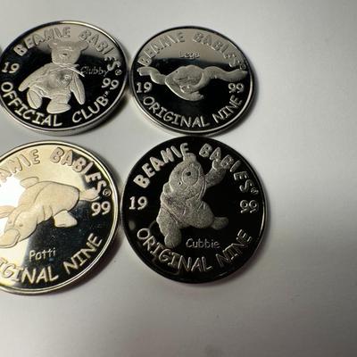 Sale Photo Thumbnail #744: Set of six 1999 TY Beanie Babies Official Club coins. These coins were part of the Beanie Babies Official Club (BBOC) and were released as part of the Clubby II Platinum Kit in 1999.