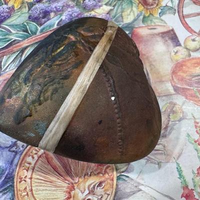 Sale Photo Thumbnail #780: Raku-fired ceramic heart-shaped InnerSpirit Rattle by J. Davis Studio, also commonly referred to as a Spirit Shaker. This handcrafted art piece features: 
Raku Pottery: The heart is made using the Raku firing technique, a Japanese pottery method where pie