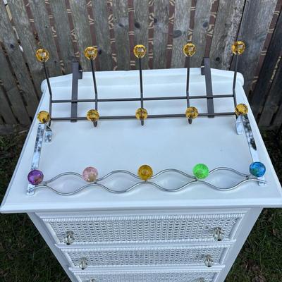 LOT 48: White Chest of Drawer, Mirrored Shelf w/Glass Pegs along with 2-Over the Door Hanging Clothes Racks