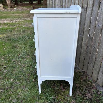 LOT 48: White Chest of Drawer, Mirrored Shelf w/Glass Pegs along with 2-Over the Door Hanging Clothes Racks