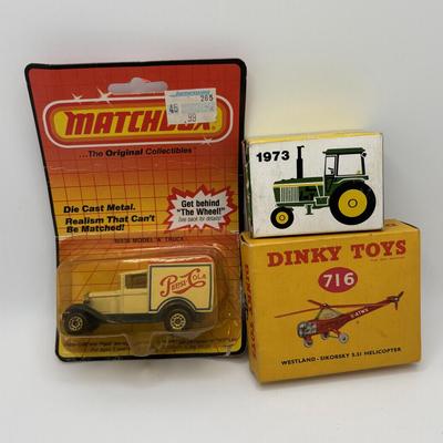 LOT 54: Dinky Toys Westland Sikorsky S.51 Helicopter, Budgie Toy England Low Loader, 1973 John Deere Tractor & More