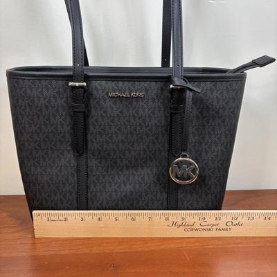 LOT 60: Michael Kors Jet Set Travel Signature Tote Bag & Monogram Wristlet