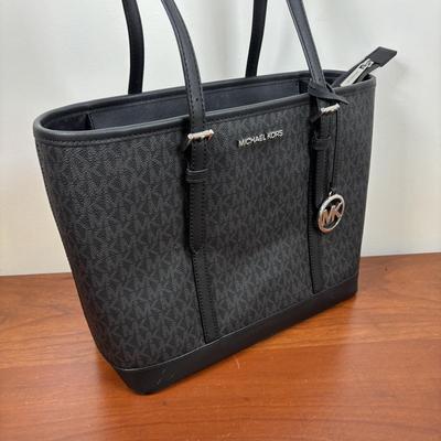LOT 60: Michael Kors Jet Set Travel Signature Tote Bag & Monogram Wristlet