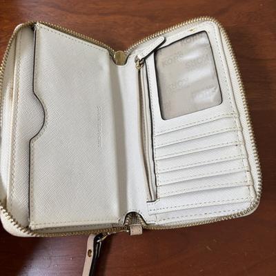 LOT 61: Michael Kors Jet Set Travel Medium Logo Crossbody Bag & Jet Set Continental Wallet in Vanilla Signature Print