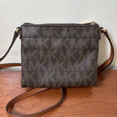 LOT 61: Michael Kors Jet Set Travel Medium Logo Crossbody Bag & Jet Set Continental Wallet in Vanilla Signature Print
