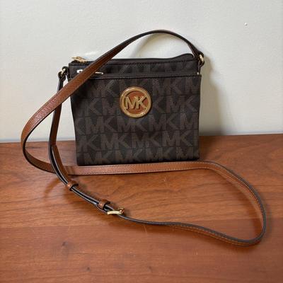 LOT 61: Michael Kors Jet Set Travel Medium Logo Crossbody Bag & Jet Set Continental Wallet in Vanilla Signature Print
