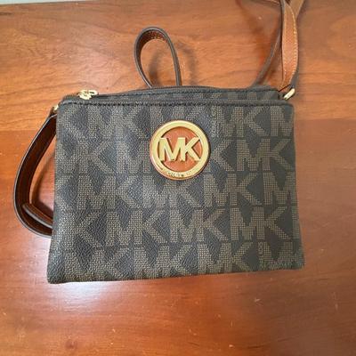 LOT 61: Michael Kors Jet Set Travel Medium Logo Crossbody Bag & Jet Set Continental Wallet in Vanilla Signature Print