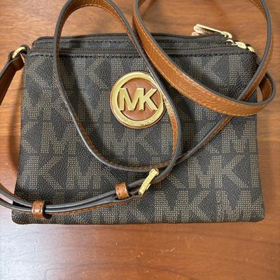 LOT 61: Michael Kors Jet Set Travel Medium Logo Crossbody Bag & Jet Set Continental Wallet in Vanilla Signature Print