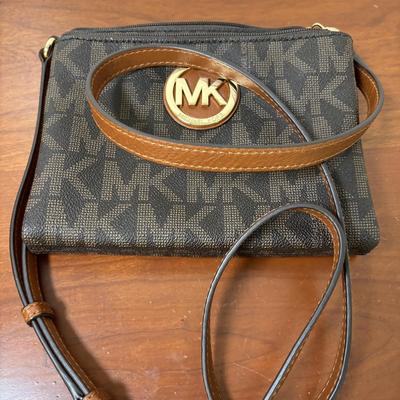 LOT 61: Michael Kors Jet Set Travel Medium Logo Crossbody Bag & Jet Set Continental Wallet in Vanilla Signature Print