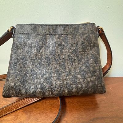 LOT 61: Michael Kors Jet Set Travel Medium Logo Crossbody Bag & Jet Set Continental Wallet in Vanilla Signature Print