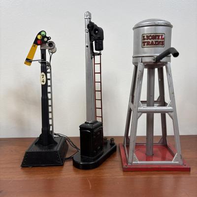 LOT 65: Lionel Train Accessories, Bottle Brush Trees, Noma Electronic Railroad Station Records and Record Player (for parts) & Toy...