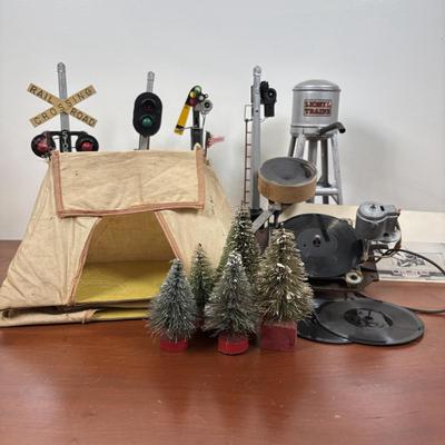 LOT 65: Lionel Train Accessories, Bottle Brush Trees, Noma Electronic Railroad Station Records and Record Player (for parts) & Toy...