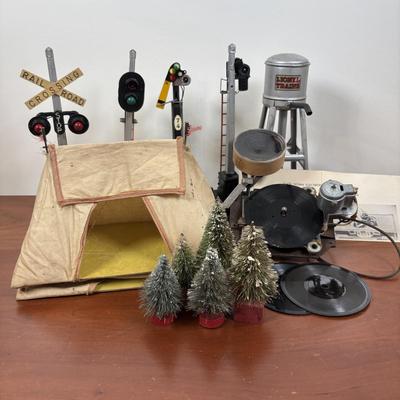 LOT 65: Lionel Train Accessories, Bottle Brush Trees, Noma Electronic Railroad Station Records and Record Player (for parts) & Toy...