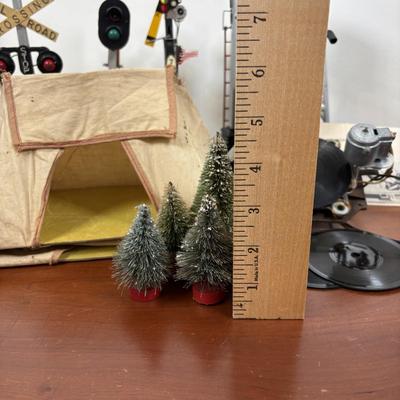 LOT 65: Lionel Train Accessories, Bottle Brush Trees, Noma Electronic Railroad Station Records and Record Player (for parts) & Toy...