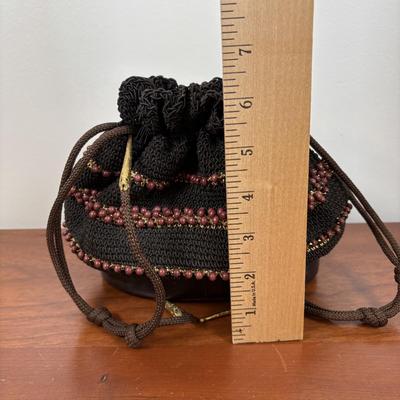 LOT 72: Ladies Collection of Perfumes, Pig Skin Gloves (1), Hobo Bag, Handmade Purses, Adrienne Vittadini Scarf & Home Decor