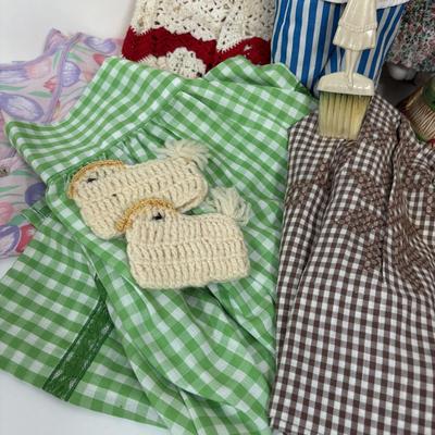 LOT 73: Porcelain Chef Pig & Assistant, Vintage Aprons & Cookbooks, Flatware, Cherry Wood Bowl & More
