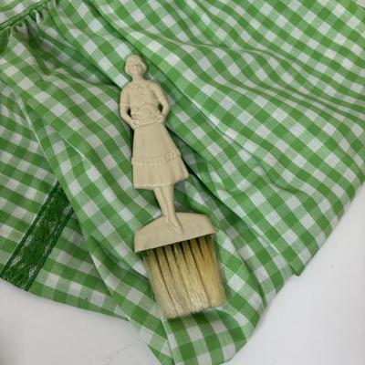 LOT 73: Porcelain Chef Pig & Assistant, Vintage Aprons & Cookbooks, Flatware, Cherry Wood Bowl & More