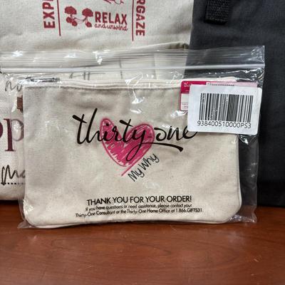 LOT 93: Collection of Thirty-One Tote Bags & Clutch Bags