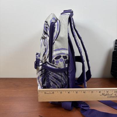 LOT 105: Thirty-One Lil' Go Geo Pop Purple Backpack, Black Beauty Pebble Clutch, Starlit Stripe Tote & More