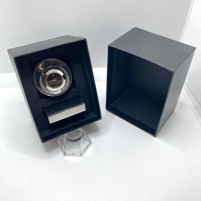 LOT 109: Movado Orb Desk Clock in Original Box and Prism Style Watch