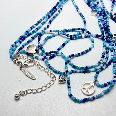 LOT 111: Collection of Beaded Pendant Necklaces - Robert Rose and More