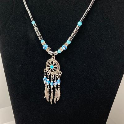 LOT 111: Collection of Beaded Pendant Necklaces - Robert Rose and More
