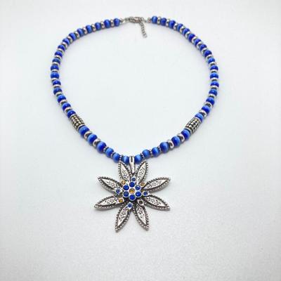 LOT 111: Collection of Beaded Pendant Necklaces - Robert Rose and More