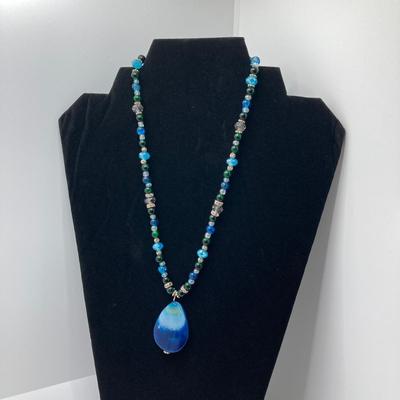 LOT 111: Collection of Beaded Pendant Necklaces - Robert Rose and More
