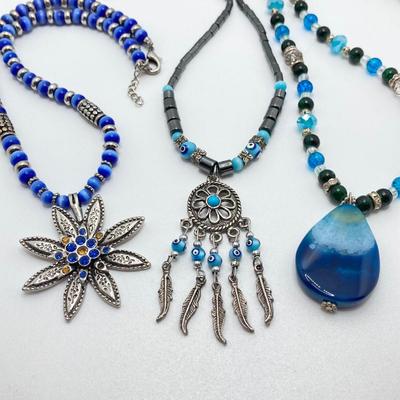 LOT 111: Collection of Beaded Pendant Necklaces - Robert Rose and More