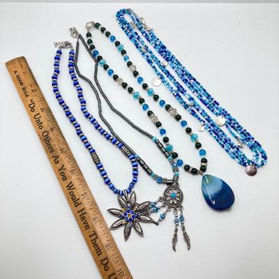LOT 111: Collection of Beaded Pendant Necklaces - Robert Rose and More