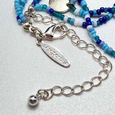 LOT 111: Collection of Beaded Pendant Necklaces - Robert Rose and More