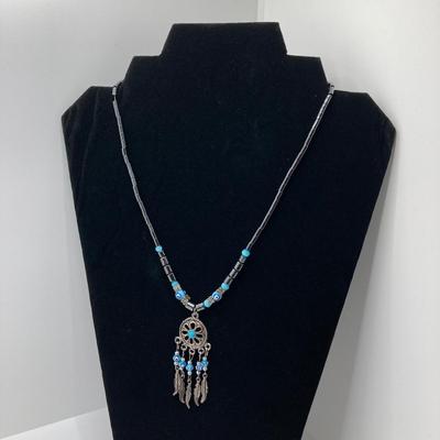 LOT 111: Collection of Beaded Pendant Necklaces - Robert Rose and More