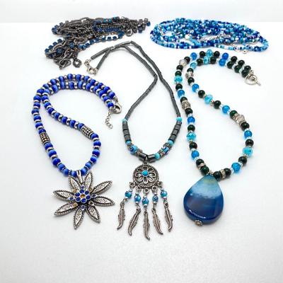 LOT 111: Collection of Beaded Pendant Necklaces - Robert Rose and More