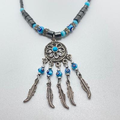 LOT 111: Collection of Beaded Pendant Necklaces - Robert Rose and More