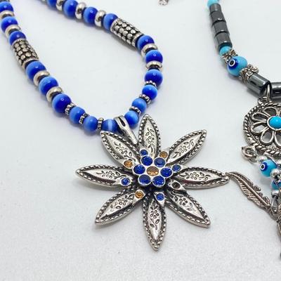 LOT 111: Collection of Beaded Pendant Necklaces - Robert Rose and More