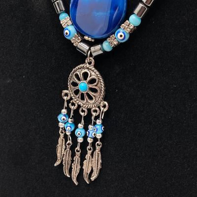 LOT 111: Collection of Beaded Pendant Necklaces - Robert Rose and More