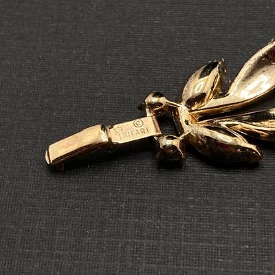 LOT 115: Vintage Gold Tone Jewelry - Trifari, Avon and More