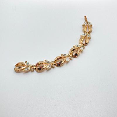 LOT 115: Vintage Gold Tone Jewelry - Trifari, Avon and More