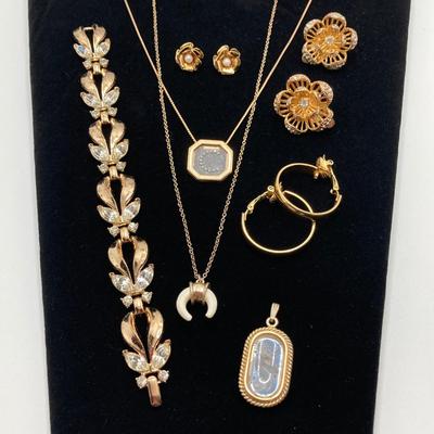 LOT 115: Vintage Gold Tone Jewelry - Trifari, Avon and More