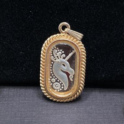 LOT 115: Vintage Gold Tone Jewelry - Trifari, Avon and More