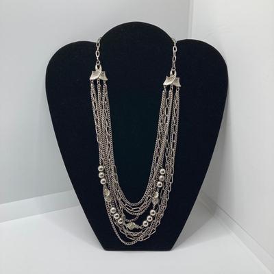 LOT 134: Silver Tone Pendant Necklaces / Chains
