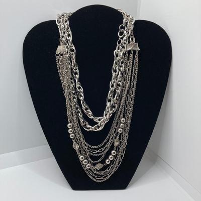 LOT 134: Silver Tone Pendant Necklaces / Chains