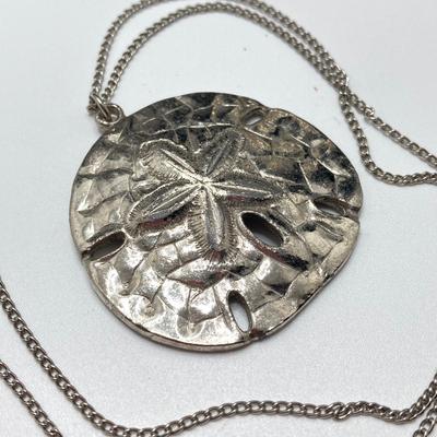 LOT 134: Silver Tone Pendant Necklaces / Chains