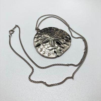LOT 134: Silver Tone Pendant Necklaces / Chains